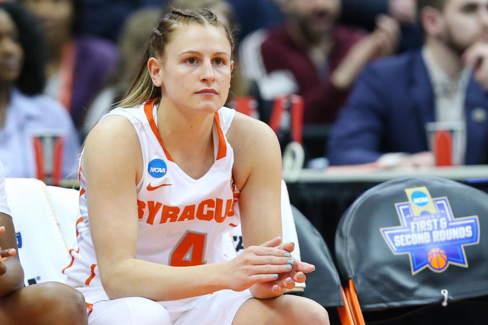 SYRACUSE, NY - MARCH 25: Tiana Mangakahia #4 of the Syracuse Orange sits on the bench prior to the game against the South Dakota State Jackrabbits in the second round of the 2019 NCAA Women's Basketball Tournament at the Carrier Dome on March 25, 2019 in Syracuse, New York. (Photo by Rich Barnes/Getty Images)