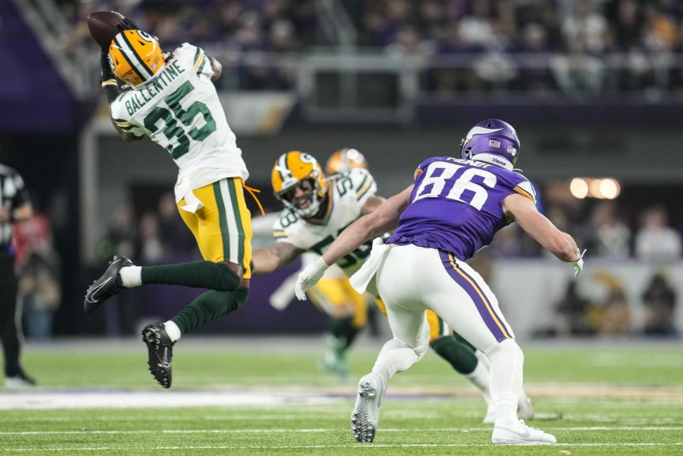 Green Bay Packers' Corey Ballentine intercepts a pass during the first half of an NFL football game against the Minnesota Vikings Sunday, Dec. 31, 2023, in Minneapolis. (AP Photo/Abbie Parr)