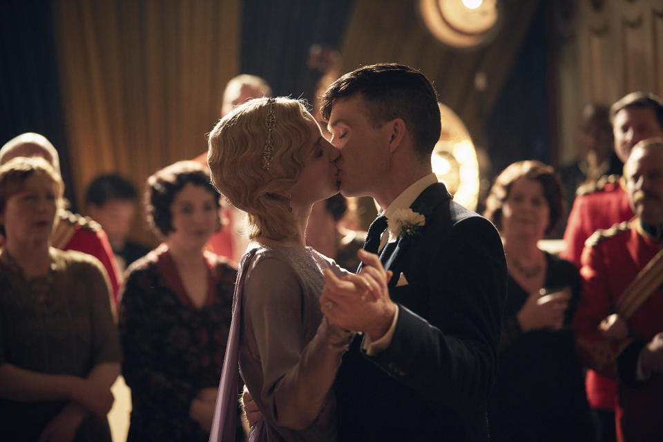 This image released by Netflix shows Annabelle Wallis as Grace, left, Cillian Murphy as Thomas Shelby in a scene from the series "Peaky Blinders." A new dance production based on the 1920′s gangster drama,“Peaky Blinders: The Redemption of Thomas Shelby,” will premiere at Birmingham Hippodrome on Tuesday Sept. 27, and tour around the U.K. (Robert Viglasky/Netflix via AP)