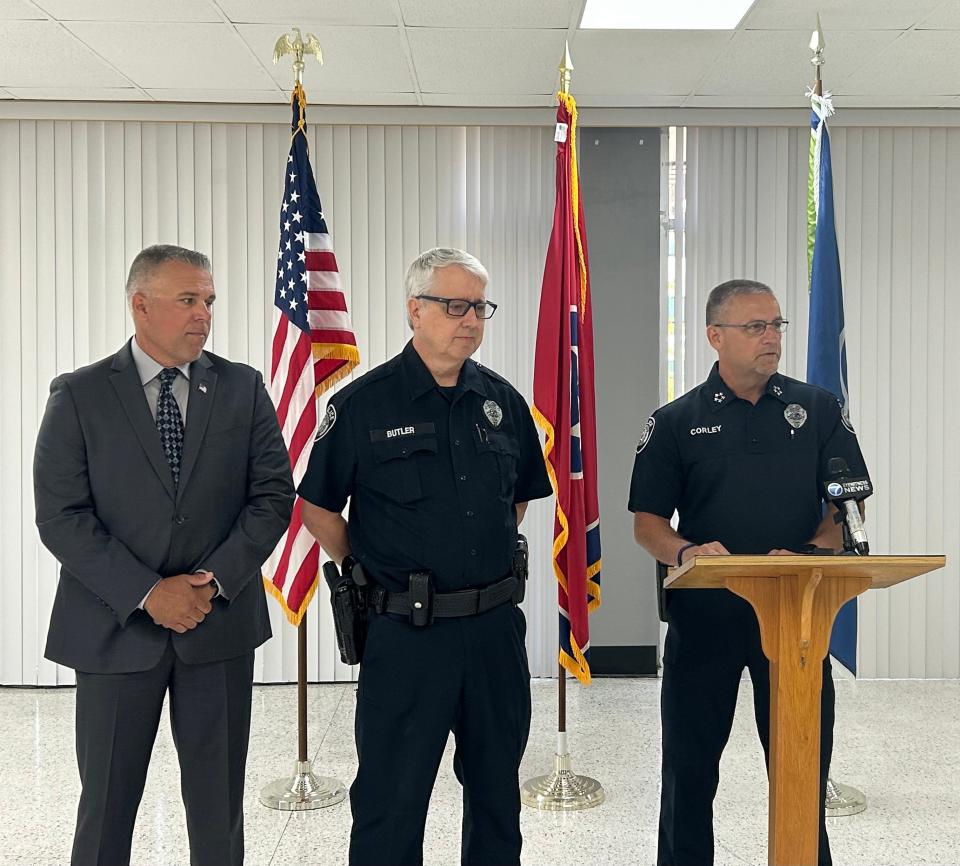 Newly introduced Litter Enforcement Officer Rick Butler stands between Madison Co. Sheriff Julian Wiser (left) and Police Chief Thom Corley (right) during a press conference at JPD Headquarters in Jackson, Tenn. on June 7, 2023.