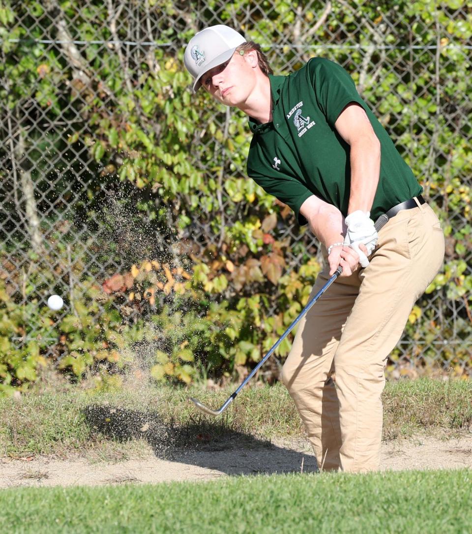 Abington's Jonathan Halpin digs out of a sand trap at the Ridder Farm Golf Course on Thursday, Sept. 29, 2022.