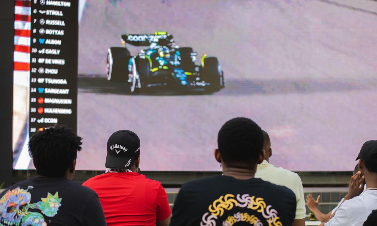 <span>Formula One fans watching last year’s British Grand Prix on screen at Salsa Loftus Park in Pretoria, South Africa.</span><span>Photograph: PaddockViewing</span>