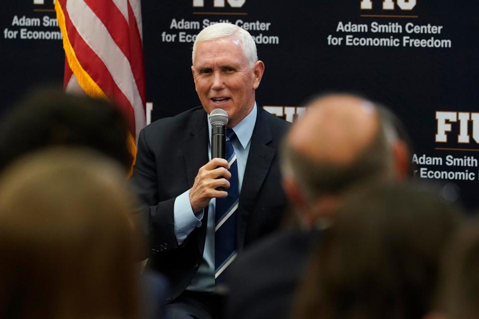 Former Vice-President Mike Pence speaks at Florida International University, Friday, Jan. 27, 2023, in Miami. Pence was talking about the economy and promoting his new book, "So Help Me God."