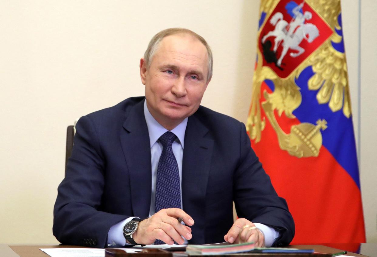 Russian President Vladimir Putin holds a meeting with winners of state culture prizes via a video link at the Novo-Ogaryovo state residence outside Moscow on March 25, 2022. - President Putin on March 25 slammed the West for discriminating against Russian culture, saying it was like the ceremonial burning of books by Nazi supporters in the 1930s. (Photo by Mikhail KLIMENTYEV / SPUTNIK / AFP) (Photo by MIKHAIL KLIMENTYEV/SPUTNIK/AFP via Getty Images)