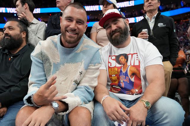 <p>Jesse D. Garrabrant/NBAE via Getty Images</p> Travis Kelce and Jason Kelce photographed in Philadelphia on May 11, 2023