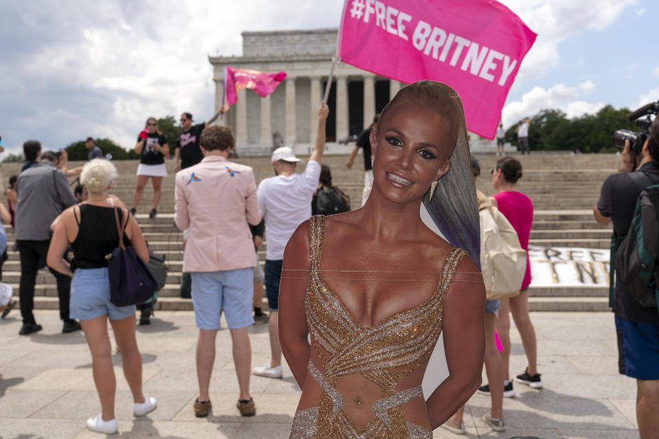 Fans and supporters of pop star Britney Spears protest at the Lincoln Memorial, during the "Free Britney" rally, Wednesday, July 14, 2021, in Washington. Rallies have been taking place across the country since the pop star spoke out against her conservatorship in court last month. (AP Photo/Jose Luis Magana)