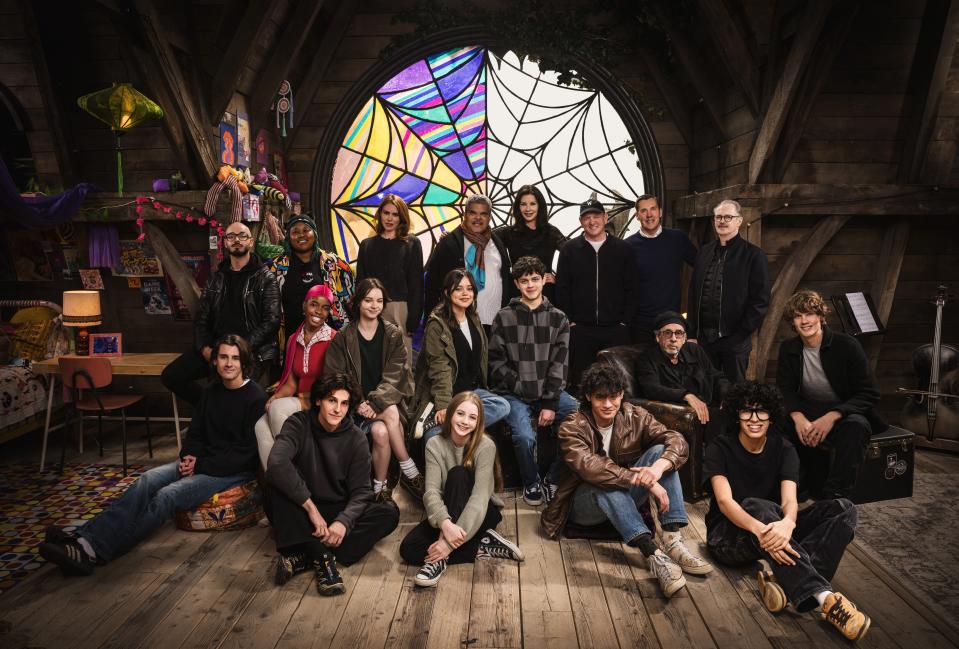 Wednesday season 2 cast! (L to R) Georgie Farmer, Victor Dorobantu, Luyanda Unati Lewis-Nayo, Joy Sunday, Owen Painter, Emma Myers, Billie Piper, Jenna Ortega, Evie Templeton, Luis Guzmán, Isaac Ordonez, Catherine Zeta-Jones, Alfred Gough, Noah Taylor, Miles Millar, Tim Burton, Steve Buscemi, Moosa Mostafa, Hunter Doohan on set.