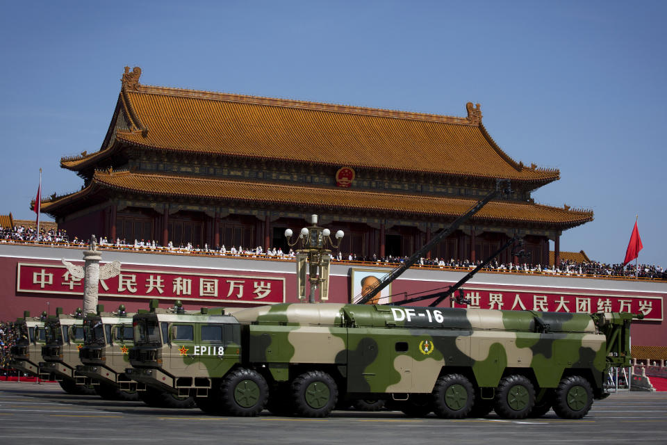 FILE - In this Sept. 3, 2015, file photo, military vehicles carry DF-16 short-range ballistic missiles past Tiananmen Gate during a military parade to commemorate the 70th anniversary of the end of World War II in Beijing. Taiwan is responding to China's defense buildup by developing missiles and interceptors of its own that could reduce Beijing's military advantage over the island, defense experts say. (AP Photo/Andy Wong)