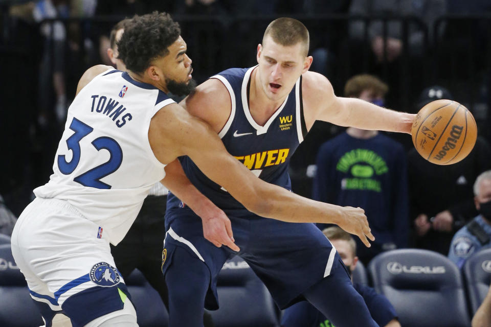 Karl-Anthony Towns and the Minnesota Timberwolves will have their hands full defending Denver Nuggets star Nikola Jokic. (Bruce Kluckhohn/USA Today Sports)