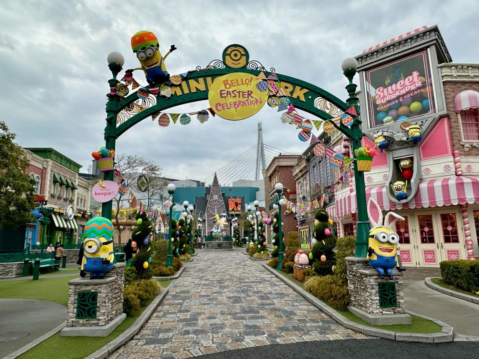 entrance to minion park at universal japan decorated for easter