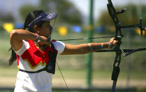 Mexican Archer Mariana Avitia, 18, in action during the selective Grand Prix of Archery for the Youth Olympic Games at the sport center of UANL on March 12, 2010 in Monterrey, Mexico. (Alfredo Lopez/Jam Media/LatinContent/Getty Images)