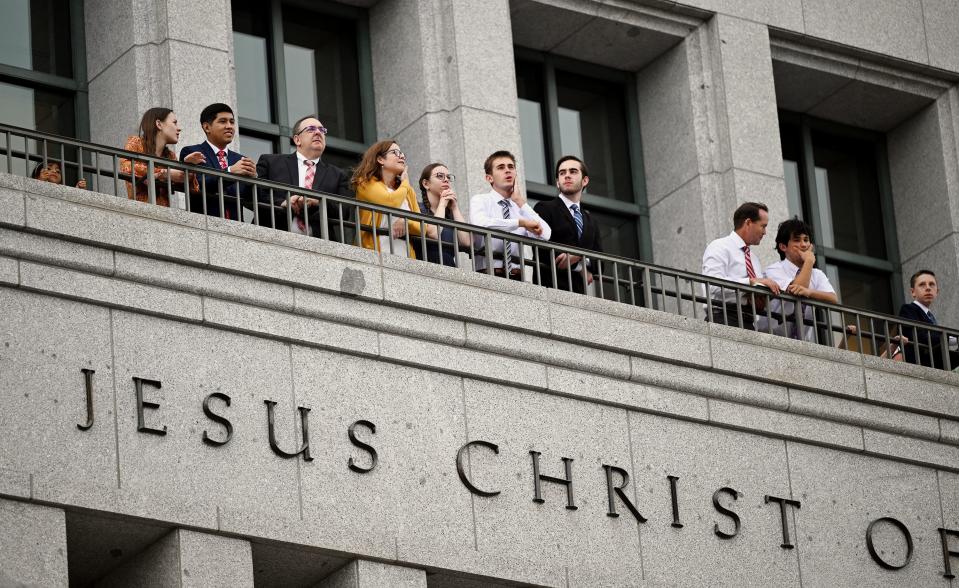 People stand and look out at the Salt Lake Temple after the Saturday afternoon session of the 193rd Semiannual General Conference of The Church of Jesus Christ of Latter-day Saints at the Conference Center in Salt Lake City on Saturday, Sept. 30, 2023. | Scott G Winterton, Deseret News