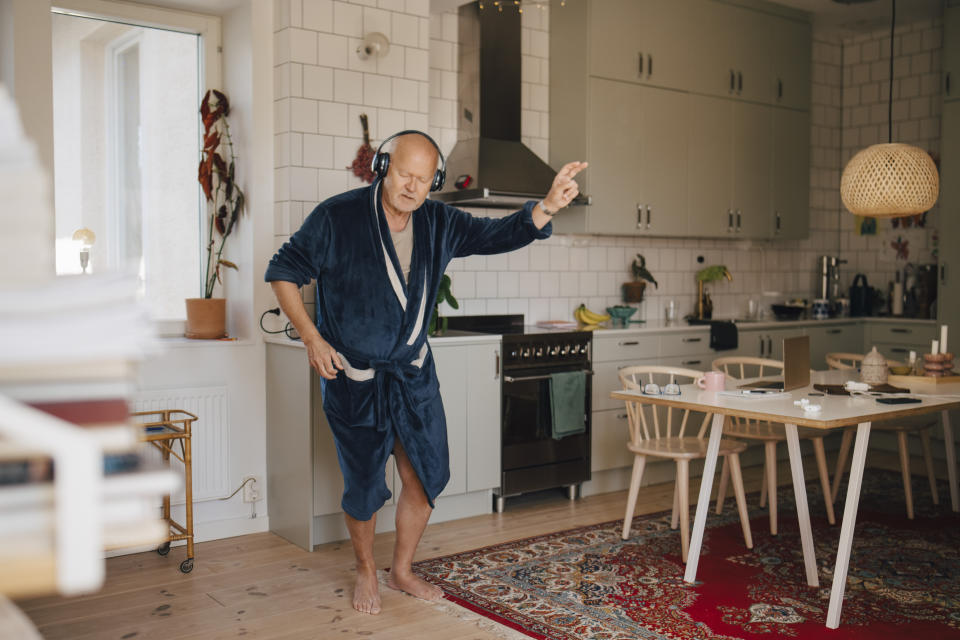 Having a little dance around your kitchen is a great way to feel good. (Getty Images)