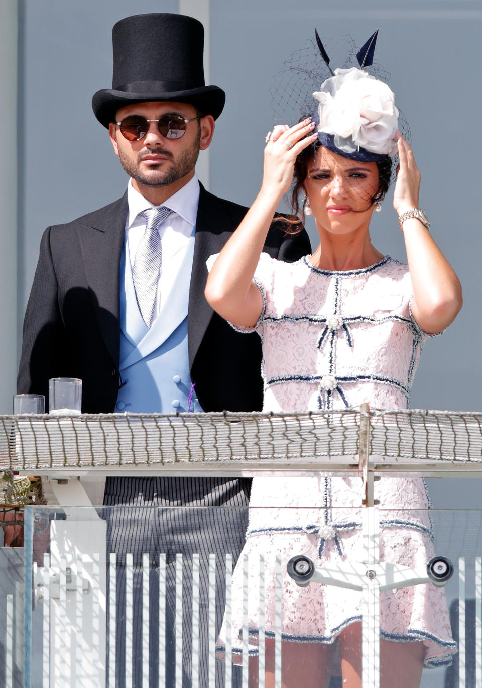 EPSOM, UNITED KINGDOM - JUNE 01: (EMBARGOED FOR PUBLICATION IN UK NEWSPAPERS UNTIL 24 HOURS AFTER CREATE DATE AND TIME) Ryan Thomas and Lucy Mecklenburgh watch the racing as they attend 'Derby Day' of the Investec Derby Festival at Epsom Racecourse on June 1, 2019 in Epsom, England. (Photo by Max Mumby/Indigo/Getty Images)