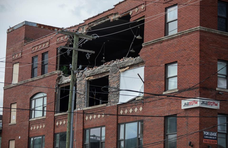 A gaping hole following a partial collapse is seen on the second floor of a building known as the Del Bene building at the corner of Winder and Russell in Detroit, across from Eastern Market on Saturday, Sept. 16, 2023.