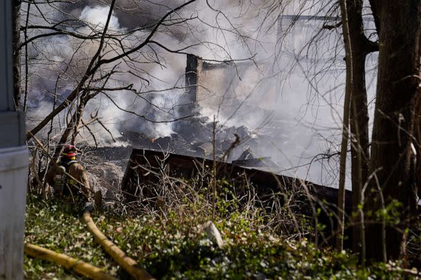 PHOTO: Firefighters continue to pour water on an industrial fire in Richmond, Ind., Wednesday, April 12, 2023. (Michael Conroy/AP)