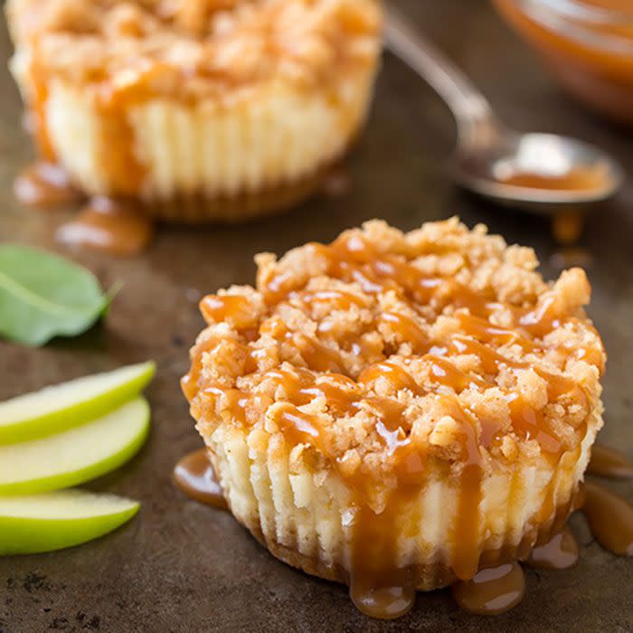 <p>Combine two seasonal dessert staples - <a rel="nofollow noopener" href="https://www.redbookmag.com/food-recipes/recipes/g1306/candy-apple-recipes/" target="_blank" data-ylk="slk:caramel apples;elm:context_link;itc:0;sec:content-canvas" class="link ">caramel apples</a> and cheesecake - into one insanely good treat. </p><p><strong>Get the recipe at <a rel="nofollow noopener" href="http://www.cookingclassy.com/2014/09/caramel-apple-mini-cheesecakes-streusel-topping/" target="_blank" data-ylk="slk:Cooking Classy;elm:context_link;itc:0;sec:content-canvas" class="link ">Cooking Classy</a>.</strong></p>