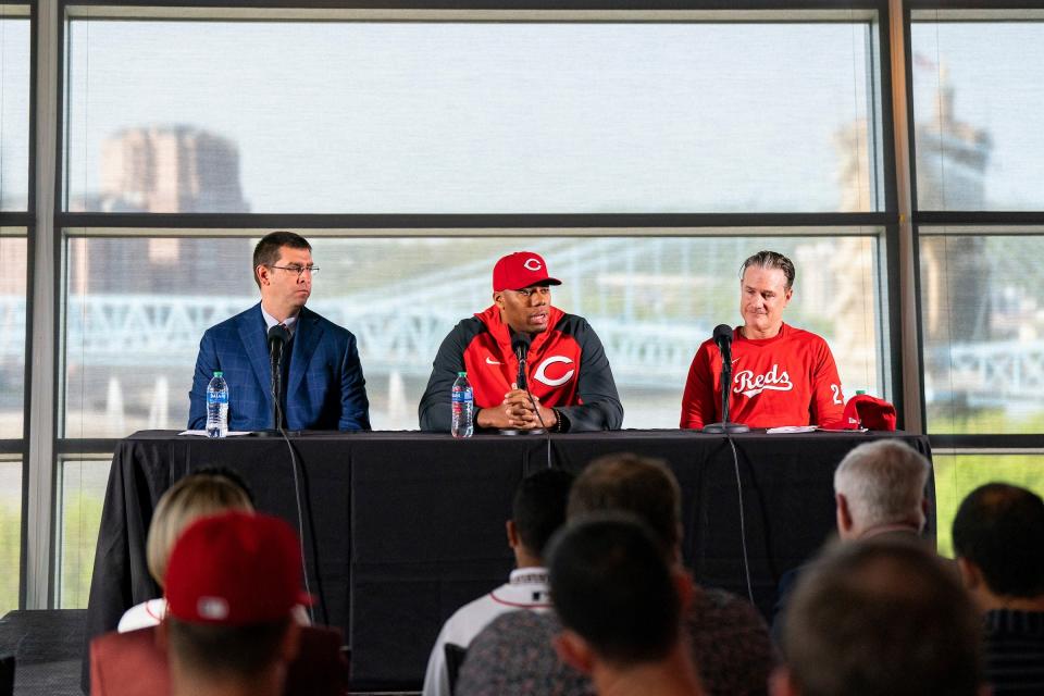 Will big-bucks young ace Hunter Green (center) be enough boost for the Reds when he returns from the IL in two weeks? Nick Krall (left) and David Bell are counting on it.