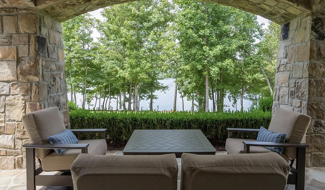 The house has several porches and outside sitting areas. Joan Herlong & Associates Sotheby’s International Realty