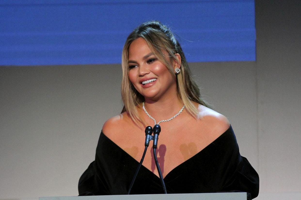 Chrissy Teigen's father, Ron Teigen Sr., got a tattoo of his daughter to celebrate her 33rd birthday.