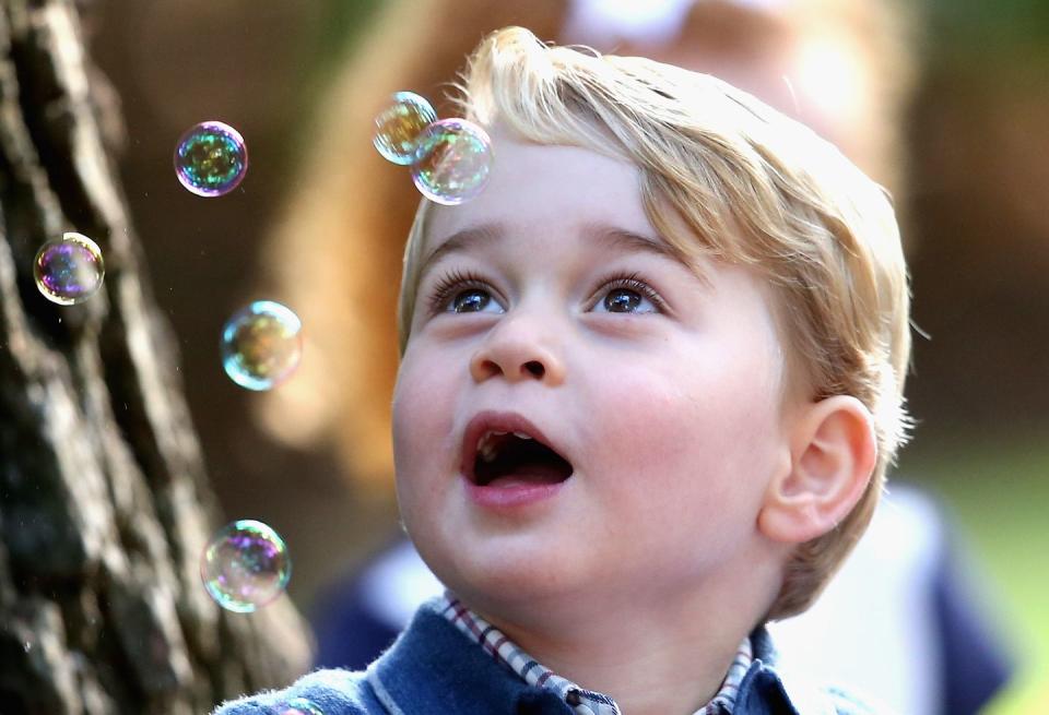 Prince George having a moment with his bubbles.