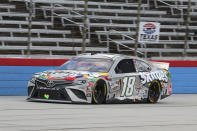 Kyle Busch drives on the front stretch during a NASCAR Cup Series auto race at Texas Motor Speedway in Fort Worth, Texas, Wednesday, Oct. 28, 2020. (AP Photo/Richard W. Rodriguez)