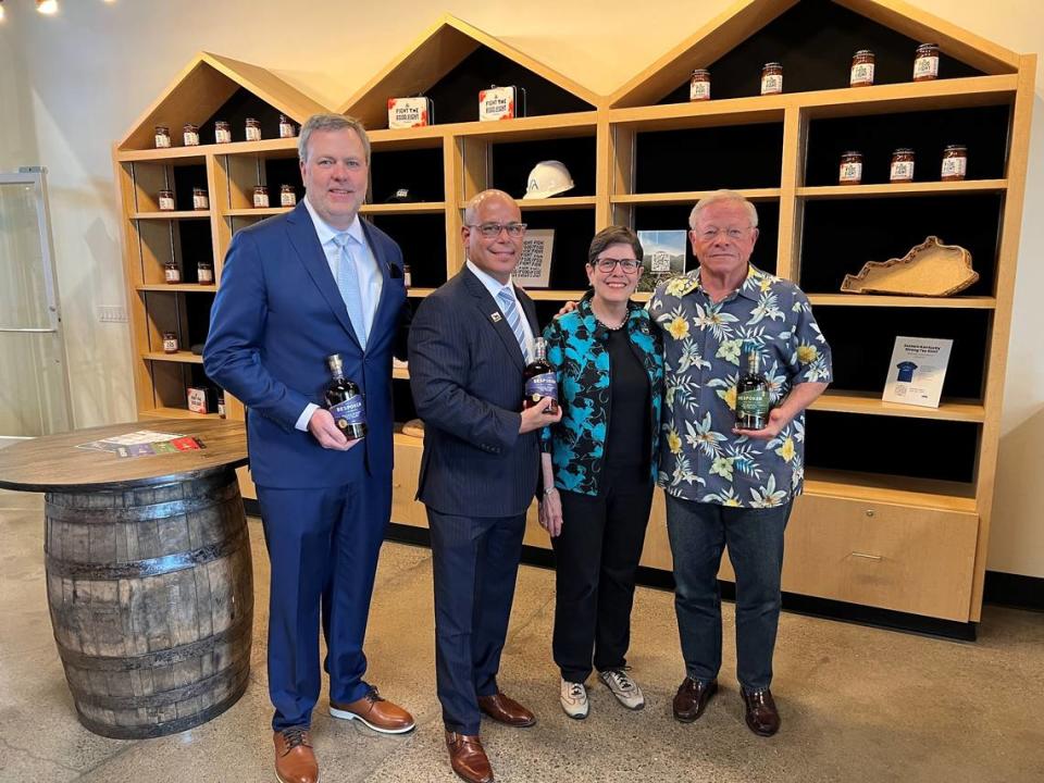 Mayor Linda Gorton met with (from left) Bespoken’s vice president Scott Savage, CEO Peter Iglesias, and owner T.J. Rodgers during a visit to Lexington.