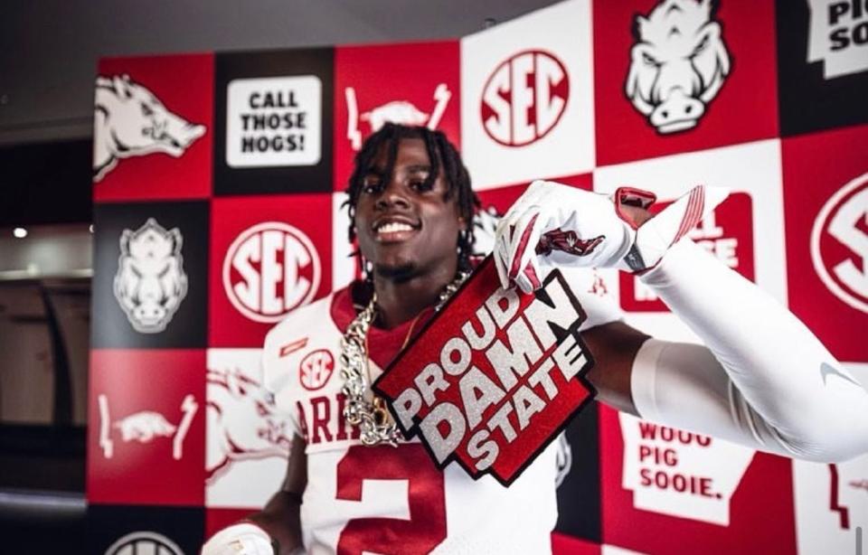 Pine Bluff High School wide receiver Courtney Crutchfield poses on a visit to the University of Arkansas prior to his commitment in June.