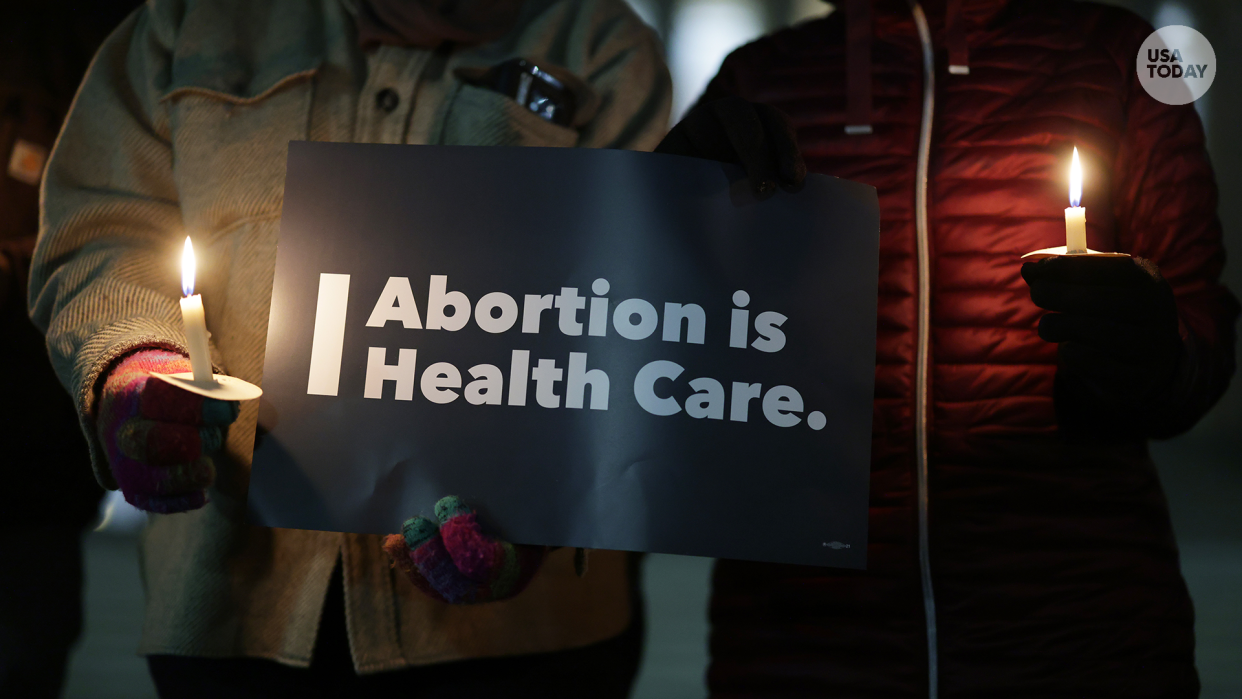 DECEMBER 13: Activists participate in a candlelight vigil on abortion rights in front of U.S. Supreme Court December 13, 2021 in Washington, DC.