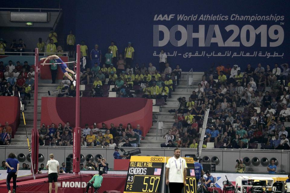 FILE - Sam Kendricks, of the United States, makes a clearance in the men's pole vault final at the World Athletics Championships in Doha, Qatar, Tuesday, Oct. 1, 2019. Qatar will host the 2022 FIFA World Cup but soccer isn't the only sport played in the Gulf Arab country. From traditional pursuits to worldwide competitions, Qatar increasingly has marketed itself as a host for sports of all sorts. (AP Photo/Nariman El-Mofty, File)