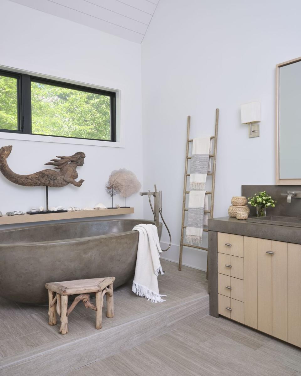 <p>Who said a bathtub had to be porcelain? At her <a href="https://www.housebeautiful.com/design-inspiration/a28608516/allison-babcock-sag-harbor-home-tour/" rel="nofollow noopener" target="_blank" data-ylk="slk:Sag Harbor home,;elm:context_link;itc:0;sec:content-canvas" class="link ">Sag Harbor home,</a> Alison Babcock chose a concrete tub to anchor the main bath. </p>