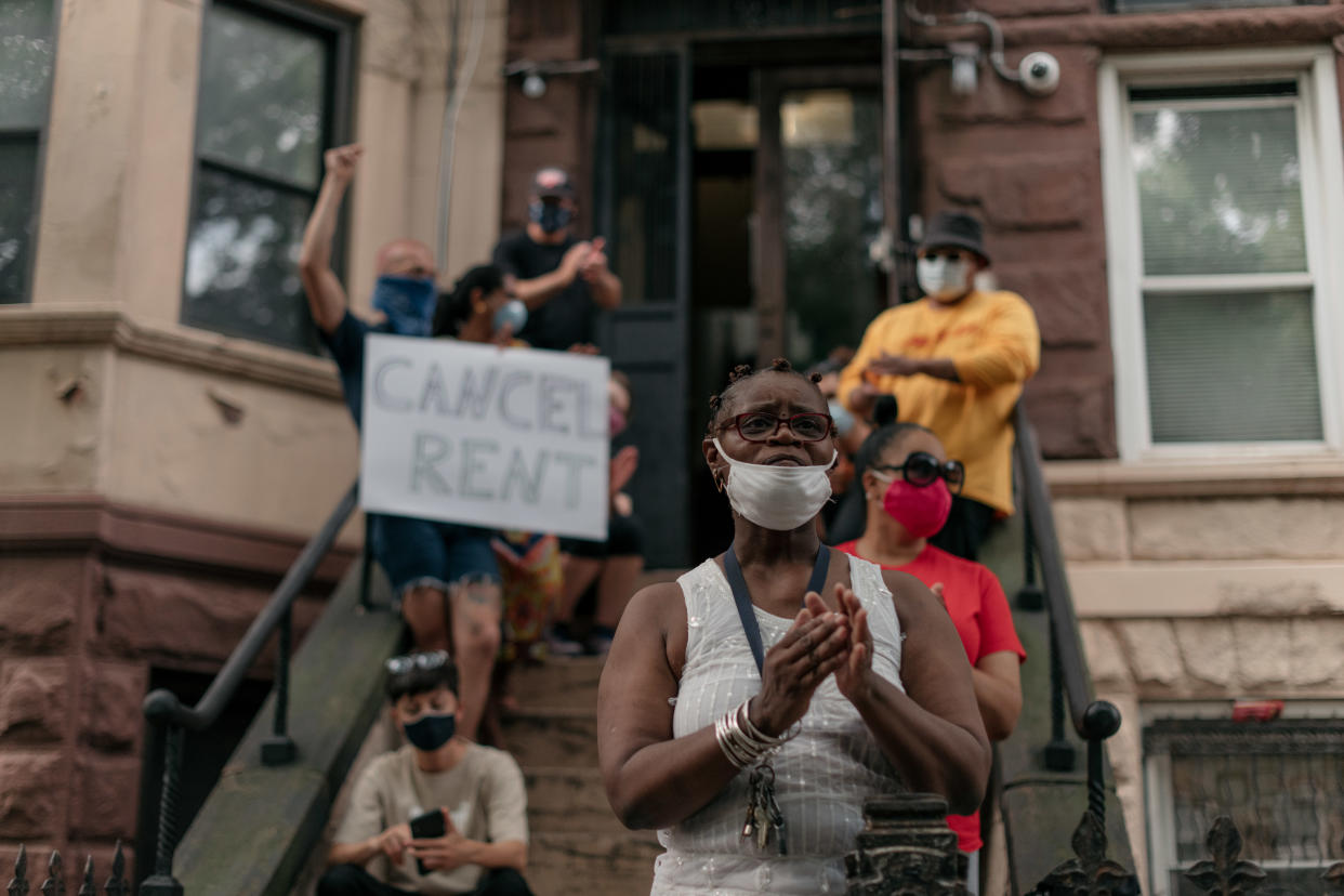 NEW YORK, NY - JULY 31: Housing activists gather to protest alleged tenant harassment by a landlord and call for cancellation of rent in the Crown Heights neighborhood on July 31, 2020 in Brooklyn, New York. Since the onset of the coronavirus crisis, millions of Americans have fallen behind on rent payments, leading many to speculate that an eviction crisis and drastic rise in homelessness is inevitable unless drastic action is taken by state and federal lawmakers. (Photo by Scott Heins/Getty Images)