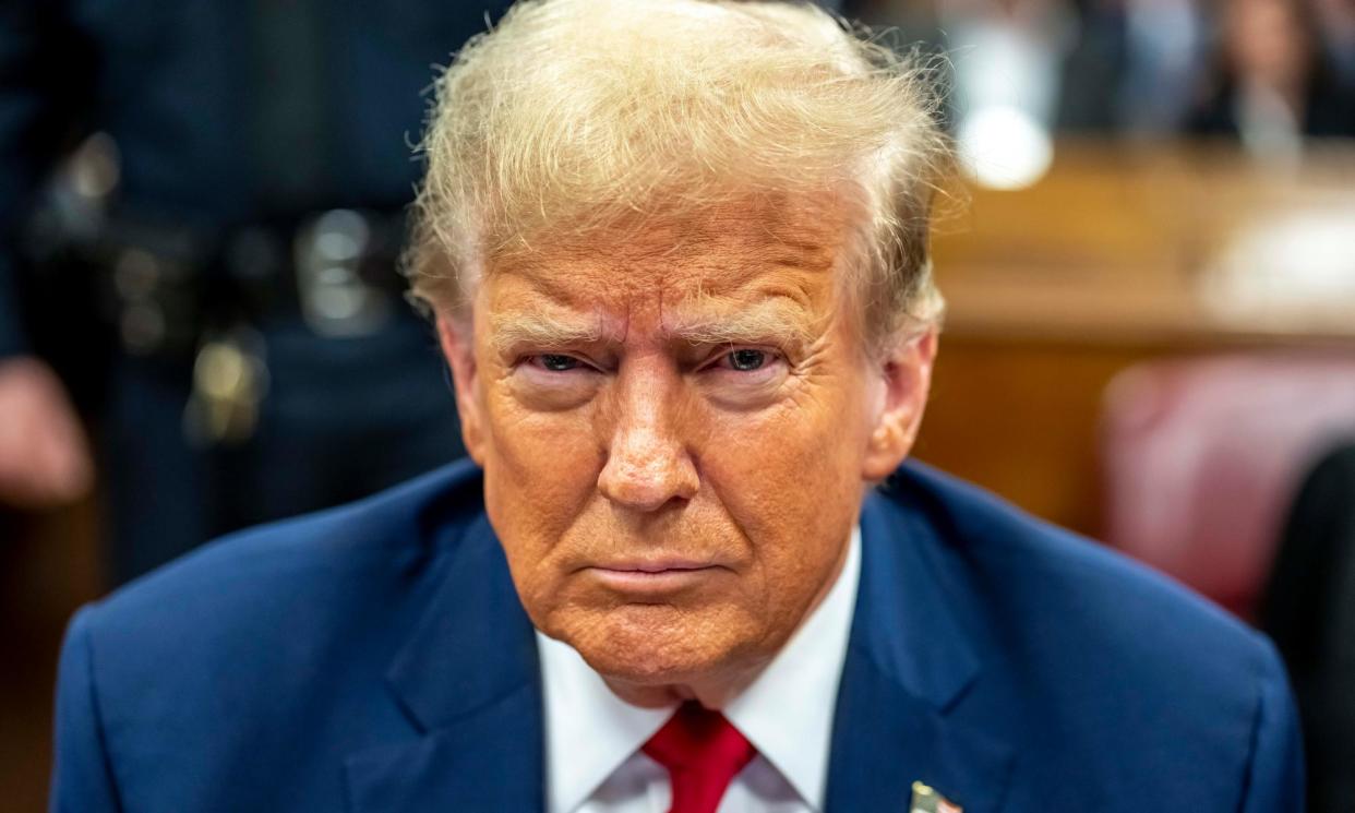 <span>Donald Trump attends session at Manhattan criminal court in New York, on Thursday.</span><span>Photograph: Mark Peterson/EPA</span>