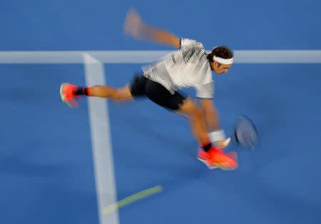 Tennis - Australian Open - Melbourne Park, Melbourne, Australia - 20/1/17 Switzerland's Roger Federer hits a shot during his Men's singles third round match against Czech Republic's Tomas Berdych. REUTERS/Jason Reed