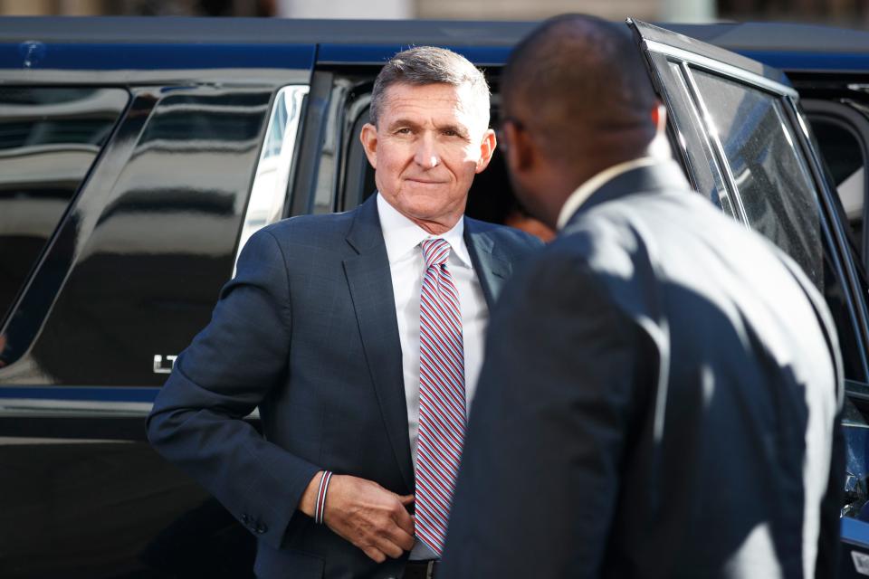 President Donald Trump's former National Security Advisor Michael Flynn arrives at federal court in Washington, Tuesday, Dec. 18, 2018. President Donald Trump has pardoned Michael Flynn, taking direct aim in the final days of his administration at a Russia investigation that he has long insisted was motivated by political bias. Trump announced the pardon on Wednesday, Nov. 25, 2020 calling it his “Great Honor.” 