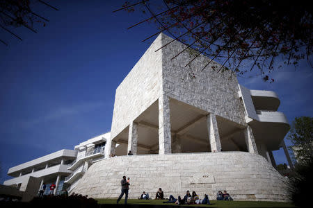 FILE PHOTO: People walk around the Getty Center art museum and tourist landmark in Los Angeles, California, U.S. on March 27, 2016. REUTERS/Lucy Nicholson/File Photo