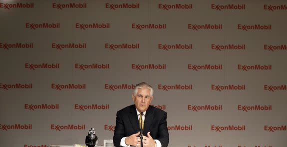 ExxonMobil CEO Rex Tillerson speaks to reporters after the annual meeting ExxonMobil shareholders meeting in Dallas, Wednesday, May 28, 2014.