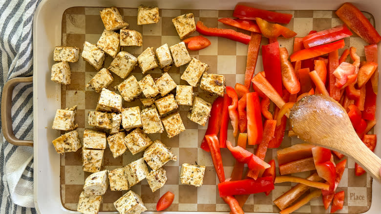 tofu and peppers on pan