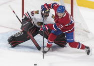 Montreal Canadiens' Nick Cousins moves in on Chicago Blackhawks goaltender Corey Crawford during the second period of an NHL hockey game Wednesday, Jan. 15, 2020, in Montreal. (Graham Hughes/The Canadian Press via AP)