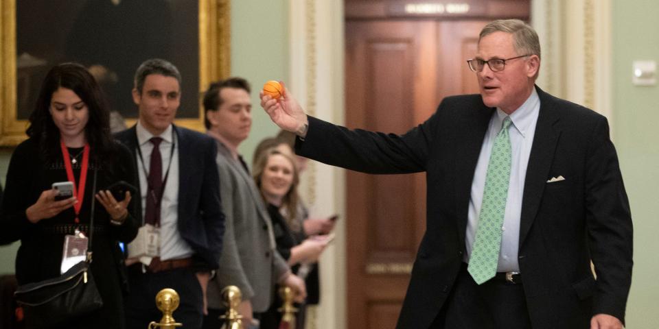 Sen. Richard Burr R-NC., displays a stress ball as he walks to the Senate Chamber prior to the start of the impeachment trial of President Donald Trump at the U.S. Capitol, Thursday, Jan. 23, 2020, in Washington. (AP Photo/Steve Helber)