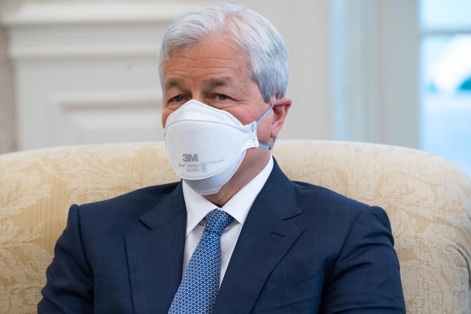 Jamie Dimon, Chairman and CEO of JPMorgan Chase, attends a meeting hosted by US President Joe Biden with business leaders about a Covid-19 relief bill in the Oval Office of the White House in Washington, DC, February 9, 2021. (Photo by SAUL LOEB / AFP) (Photo by SAUL LOEB/AFP via Getty Images)