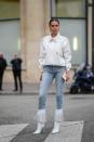 <p>White boots add a soft touch to denim ensembles in the colder months – mix up your usual winter ensembles by tucking your jeans into a statement pair. Extra points for fringing. </p>