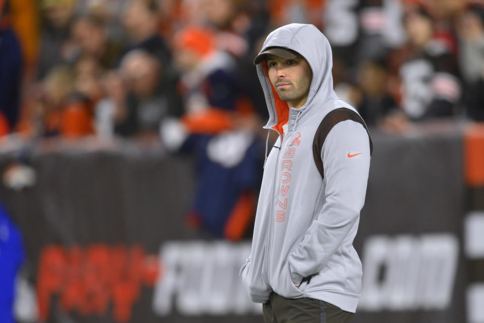 Cleveland Browns quarterback Baker Mayfield watches players warm up for an NFL football game against the Denver Broncos, Thursday, Oct. 21, 2021, in Cleveland. (AP Photo/David Richard)