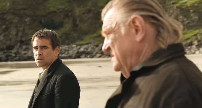Colin Farrell and Brendan Gleeson as Pádraic and Colm, respectively, standing on a beach