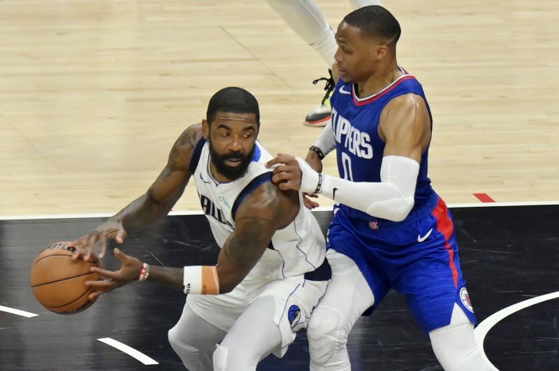 Dallas Mavericks guard Kyrie Irving (L) is considered one of the team's leaders this postseason. File Photo by Jim Ruymen/UPI