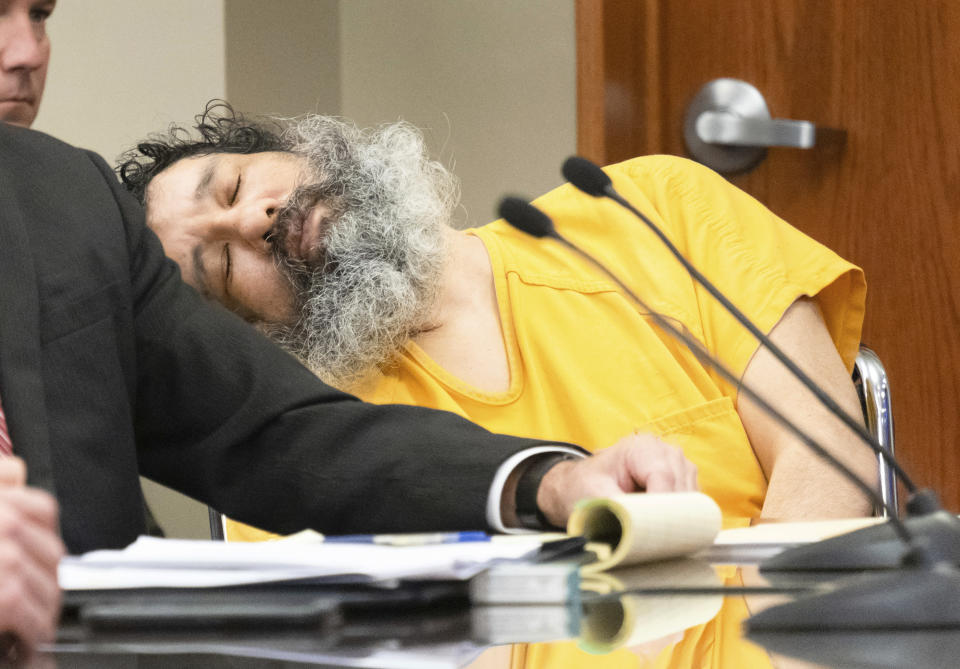 Anthony Garcia appears unresponsive at the Douglas County Court in Omaha, Neb., Friday, Sept. 14, 2018. Garcia, a former doctor, was convicted in the revenge killings of four people connected to a Nebraska medical school and has been sentenced to death by a three-judge panel. The first victims were the son and housekeeper of a faculty member at Creighton University School of Medicine in Omaha. Garcia also was found guilty in the 2013 deaths of another Creighton pathology doctor and his wife. (Kent Sievers/Omaha World-Herald via AP, Pool)
