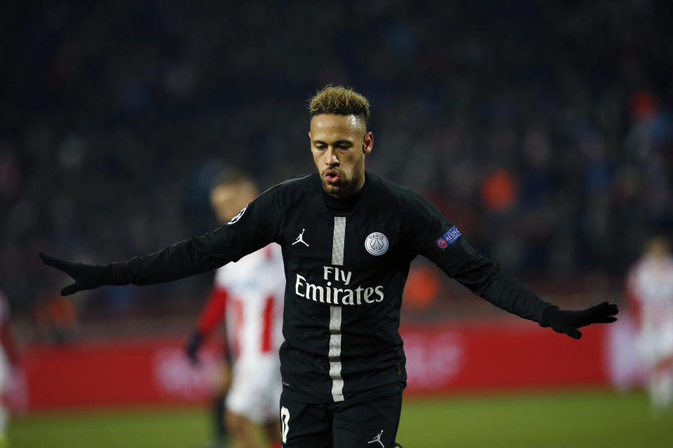 PSG forward Neymar celebrates after scoring his side' second goal during the Champions League group C soccer match between Red Star and Paris Saint Germain, in Belgrade, Serbia, Tuesday, Dec. 11, 2018. (AP Photo/Darko Vojinovic)