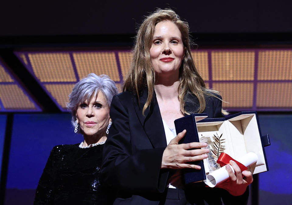 French director Justine Triet poses next to US actress Jane Fonda (L)