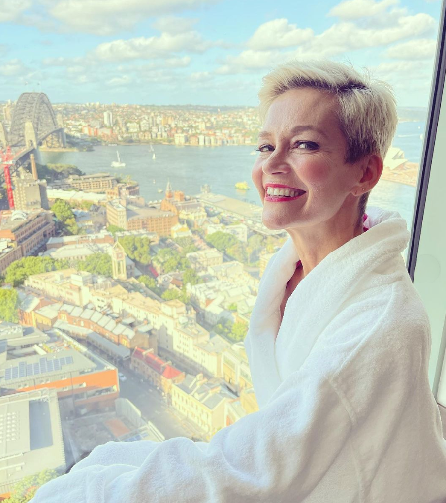 Jess Rowe sits in the window of a hotel room. 