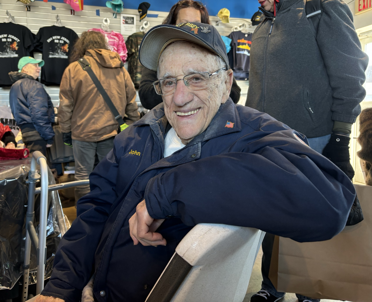 John 'Johnny Q' Quinesso, a 98-year-old Navy veteran, sits in the gift shop at the Battleship New Jersey on Thursday, March 21.